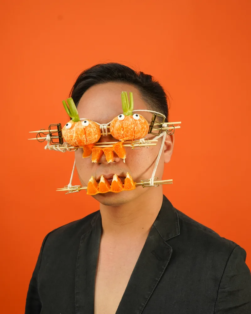 Mandarin pumpkins with celery stalks